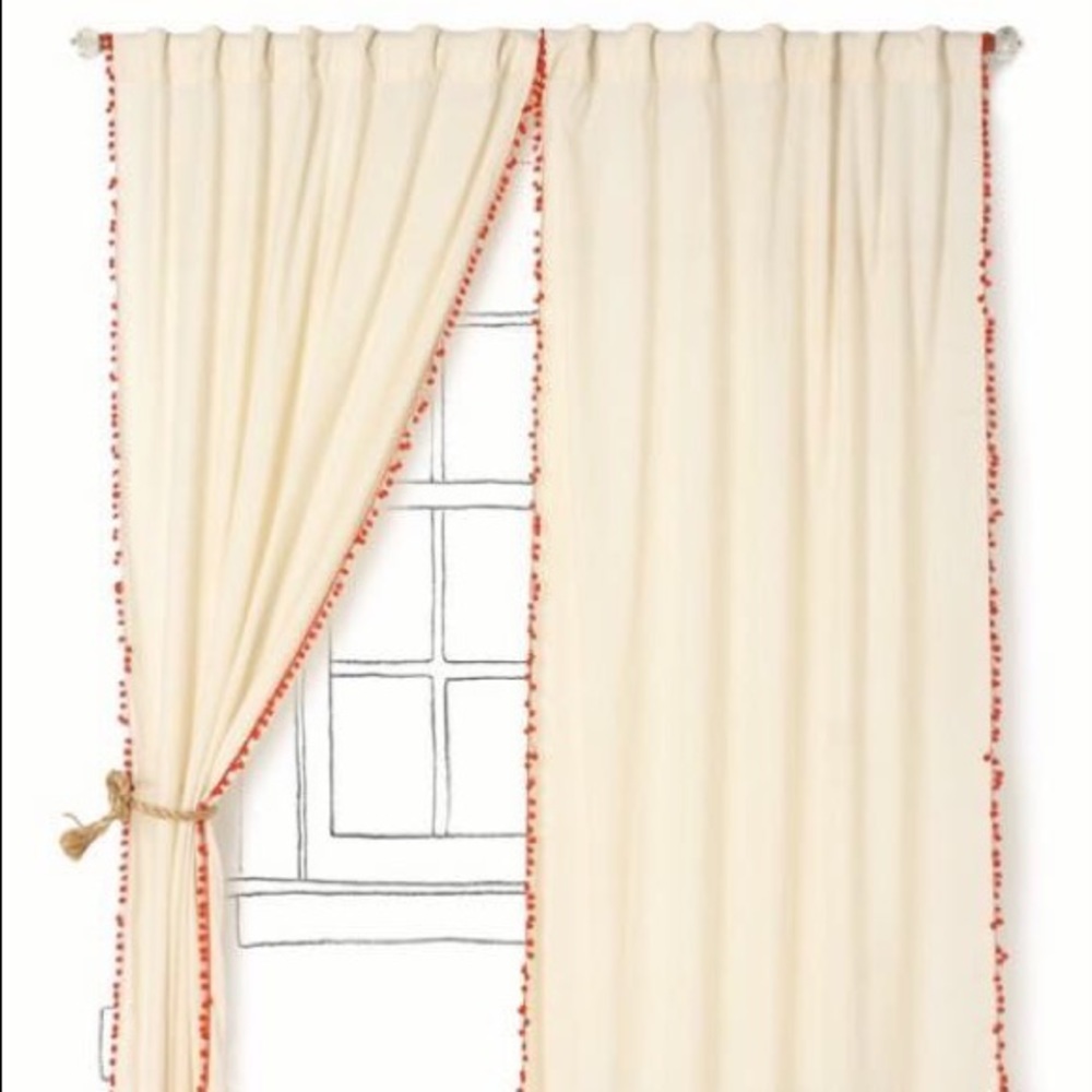 Anthropologie Pom Pom trim curtains.